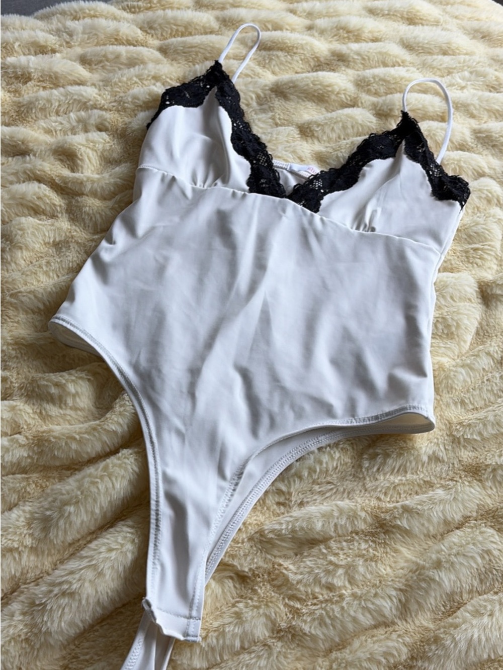 White bodysuit with black lace